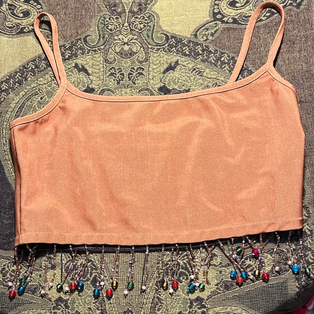 There is no tag, purchased from a boutique in Chelsea N.Y. In 1999